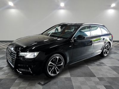 une image d'une audi wagon noire garée dans un garage