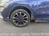 a close up of a car that has been badly damaged