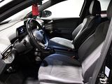 a picture of the inside of a car with the driver ' s seat up