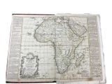 an open book with a map of africa on it