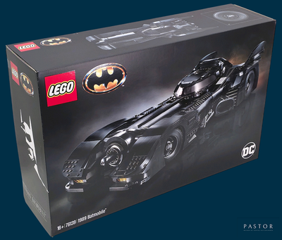 lego batman batmobile set in a box on a blue background