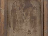 an old picture frame with a picture of a man and a woman