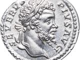 une pièce d'argent à l'effigie d'un homme coiffé d'une couronne