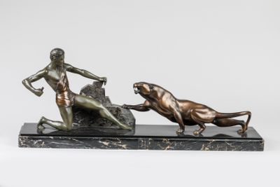 bronze statue of a man and a dog on a marble base