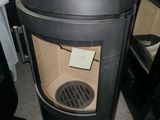 a trash can that is sitting in the middle of the floor
