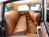 a brown leather seat in the back of a car