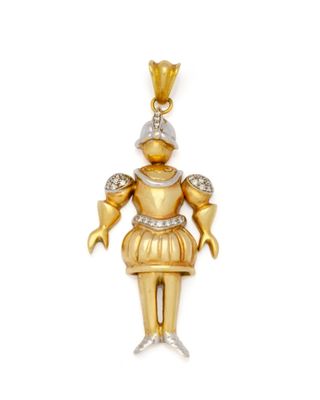 une image d'un pendentif représentant un personnage, serti d'or et de diamants