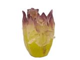 a yellow vase with a flower inside of it