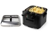 an image of a deep fryer with french fries in it