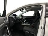 the interior of a car with the door open and the driver ' s seat down