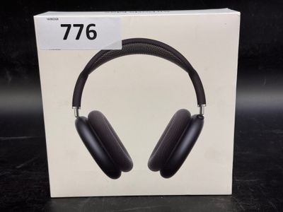 an image of a pair of headphones sitting on top of a box
