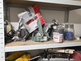 a shelf full of assorted items in a room