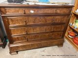 a dresser with a lot of drawers in the room