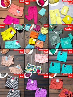 several different types of clothing are displayed on a wooden floor