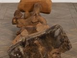 two pieces of wood sitting on the floor next to each other