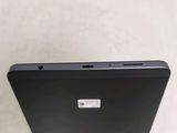 a close up of the back of a black laptop computer