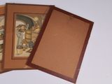 three cards with pictures of people on them on a table
