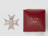 an image of a red case with a silver cross on it