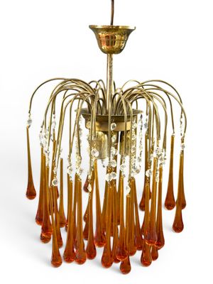 an image of a chandelier made of glass and brass