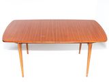 an image of a wooden table with two leaves on it