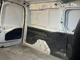 a white van that is parked in a garage