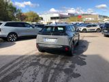 many cars parked in a parking lot in a parking lot