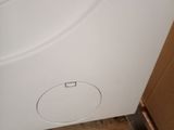 an image of a white washing machine in a room