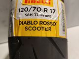 a close up of a motorcycle tire with a sticker on it