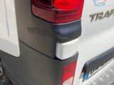 a white truck with a sign on the back of it