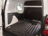 a white van with a black bed in the back of it