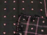 an image of a close up of a black and pink scarf