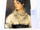 a picture of a woman in a white dress on a book