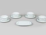 an image of a set of six white and blue dishes and cups