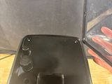 a cell phone that is sitting on a table next to a mirror
