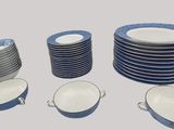a lot of plates and cups that are stacked together