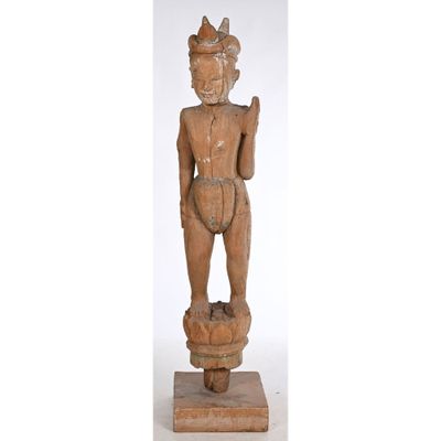 an old wooden statue of a man with a hat on his head