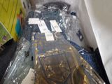 a pile of jeans that are wrapped up and ready to be shipped