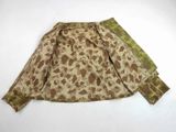 an image of a military jacket with a camouflage print on it