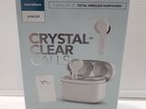 the box of the bluetooth crystal clear earphones is open on the table