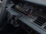 a steering wheel and dashboard of a car in a car showroom
