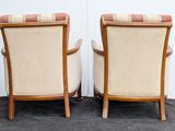 pair of mid century danish lounge chairs with upholstered arms