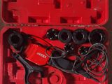 an image of a red box with tools in it on the floor