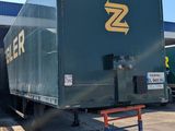 a truck that is sitting in the parking lot