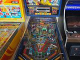 a pinball machine that is sitting on a table