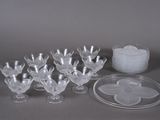 a lot of empty wine glasses and plates on the table