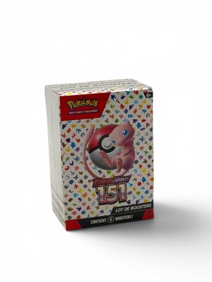 a close up of a box of pokemon trading cards on a white background