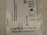 une étiquette au dos d'un sac sur laquelle est collé un autocollant