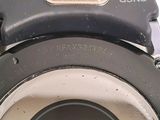 a close up view of a digital camera with a button on it