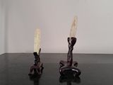 two candles that are sitting on a table