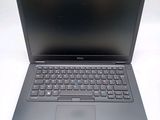 the dell laptop is open and ready to be used